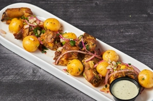COSTILLITAS DE CERDO CON PAPAS CRIOLLA